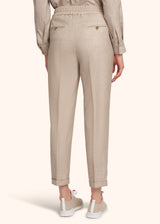 Kiton pantalon à coulisse en laine de couleur sable pour femme.