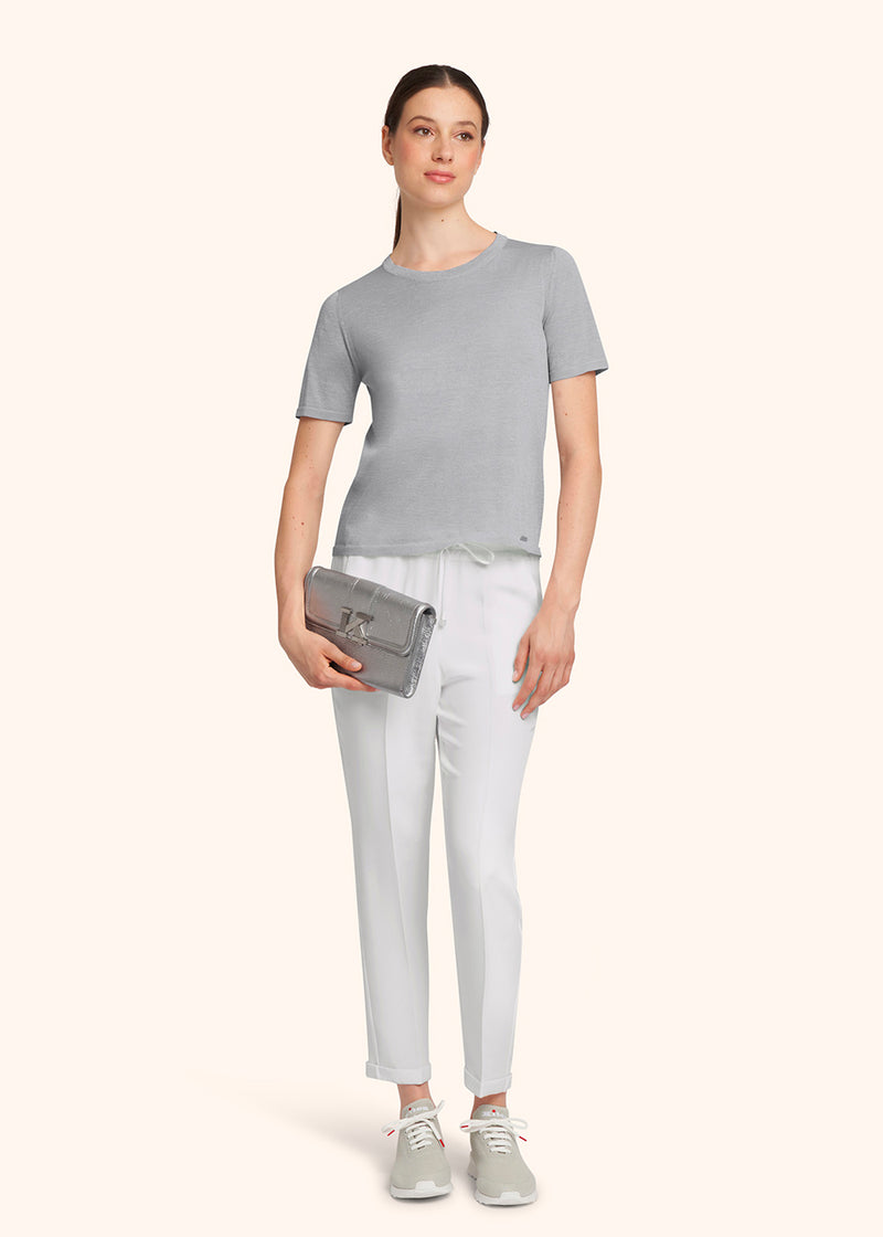 Kiton pantalon à coulisse en soie de couleur blanche pour femme.