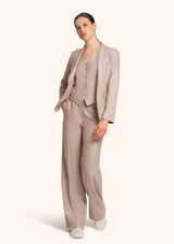 Kiton pantalon confectionné dans un luxueux mélange de soie et laine de couleur beige pour femme.