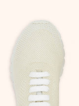 Kiton sneakers modèle « fit » en maille de cachemire de couleur crème pour femme.