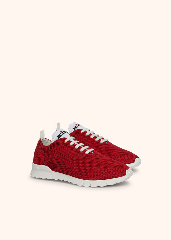 Kiton chaussures de running modèle « fit » en tissu maille de couleur rouge avec semelle blanche pour femme.
